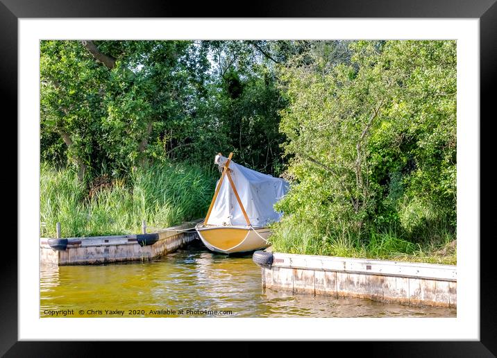 Wooden boat moored in the Norfolk Broads Framed Mounted Print by Chris Yaxley