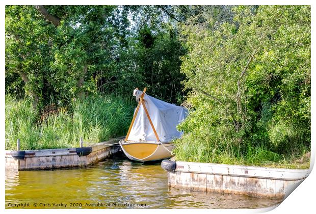 Wooden boat moored in the Norfolk Broads Print by Chris Yaxley