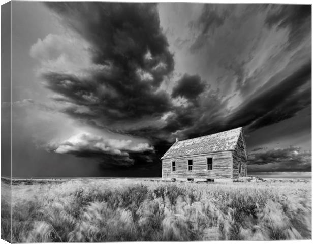 Abandoned Schoolhouse with a Storm, Colorado  Canvas Print by John Finney