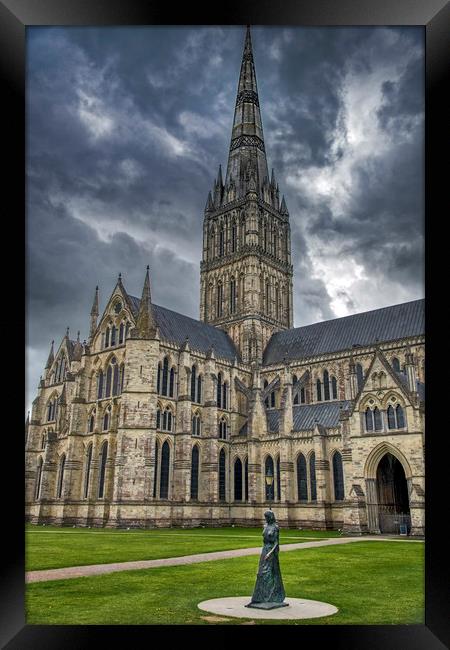 Walking Madonna and Salisbury Cathedral Framed Print by Dave Williams