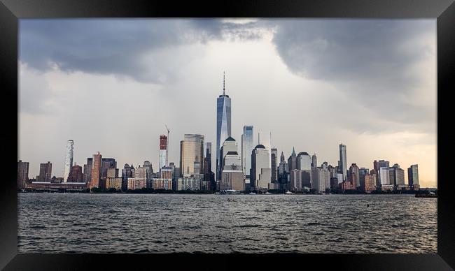 Lower Manhattan Skyline on a cloudy day, NYC, USA Framed Print by Pere Sanz
