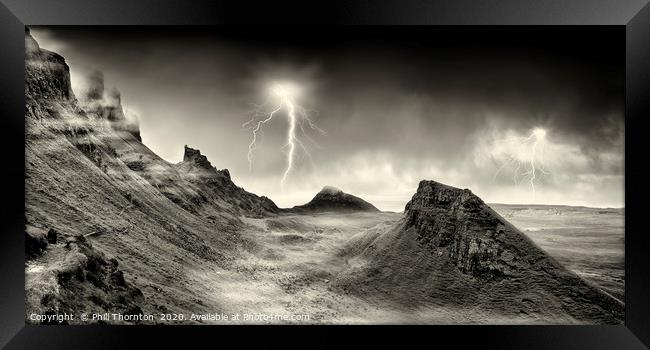 Lightning strikes over the Quiraing, Skye. Framed Print by Phill Thornton