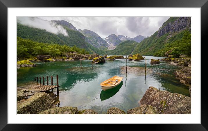 Boat in a lake close to  Buerbreen Glacier, Norway Framed Mounted Print by Pere Sanz