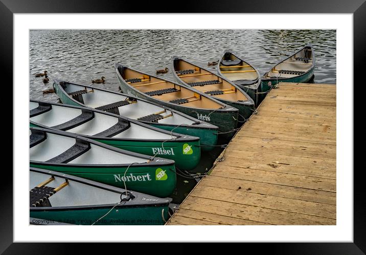 Canoes and kayaks on Salhouse Broad, Norfolk Framed Mounted Print by Chris Yaxley