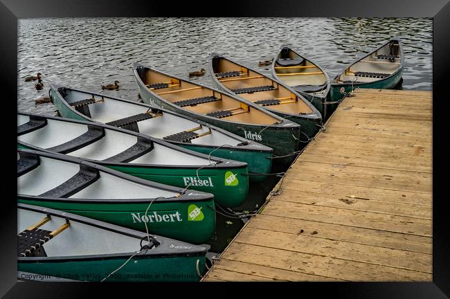 Canoes and kayaks on Salhouse Broad, Norfolk Framed Print by Chris Yaxley