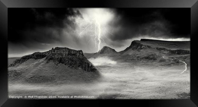 Lightning strikes over the Trotternish Ridge. Framed Print by Phill Thornton