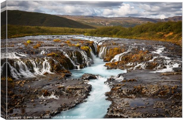 Beautiful Turquoise Bruarfoss Waterfall, Iceland  Canvas Print by Pere Sanz