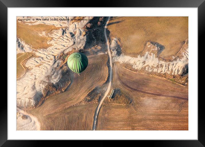 Air balloon landing over grow fields Framed Mounted Print by Pere Sanz