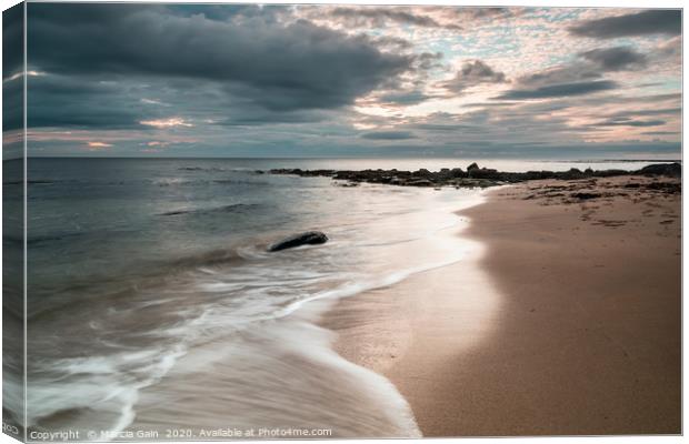 Northumberland coast at sunrise Canvas Print by Marcia Reay