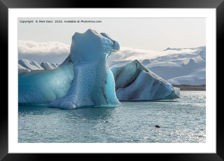 Floating icebergs in Jokulsarlon glacier lagoon Framed Mounted Print by Pere Sanz