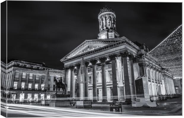 Goma, in Glasgow at night  Canvas Print by James Reilly