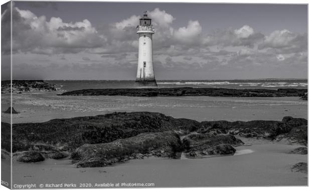 lighthouse in the clouds Canvas Print by Richard Perks