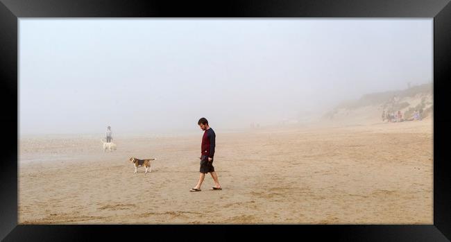 Taking a walk on the beach in summer mist Framed Print by Jenny Hibbert