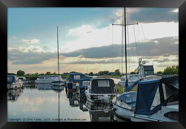 Boats moored up in Thurne Dyke Framed Print by Chris Yaxley