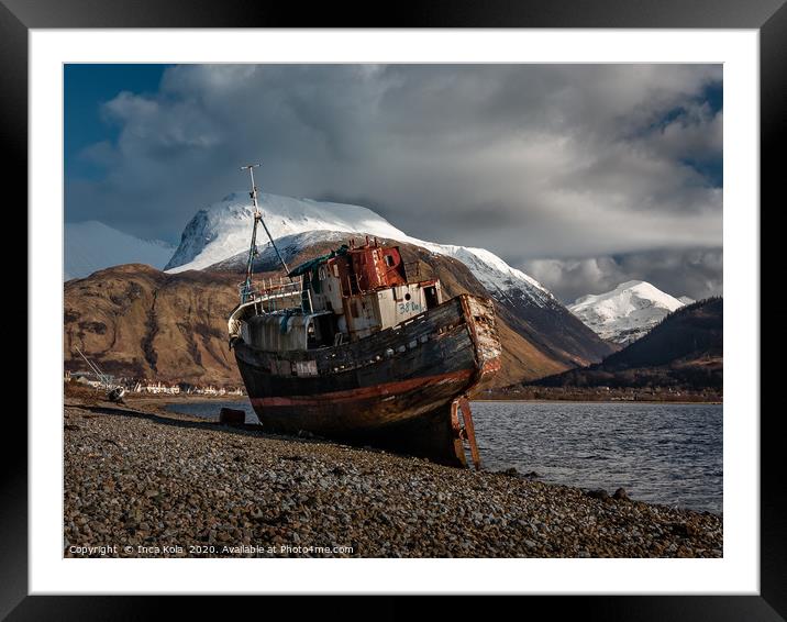Wreckage in the shadows of Ben Nevis's snow-capped Framed Mounted Print by Inca Kala