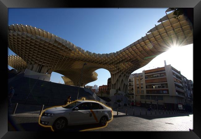 A taxi is passing in front of the so calle «mushro Framed Print by Jose Manuel Espigares Garc