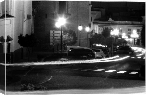 Night photography. Traffic in Carmona at light. Canvas Print by Jose Manuel Espigares Garc