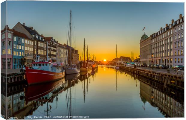 The Copenhagen Nyhavn Canal and the sunrise over t Canvas Print by Stig Alenäs