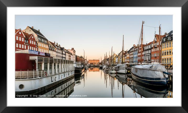 Sunrise over the calm water at Nyhavn harbor  in C Framed Mounted Print by Stig Alenäs