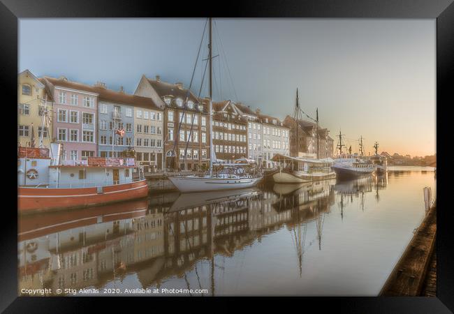 Colourful houses in the sunrise along the quay at  Framed Print by Stig Alenäs