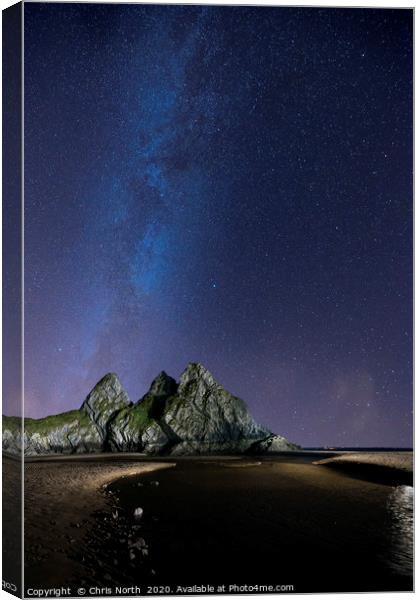 Three Cliffs Bay Gower. and the Milky Way. Canvas Print by Chris North