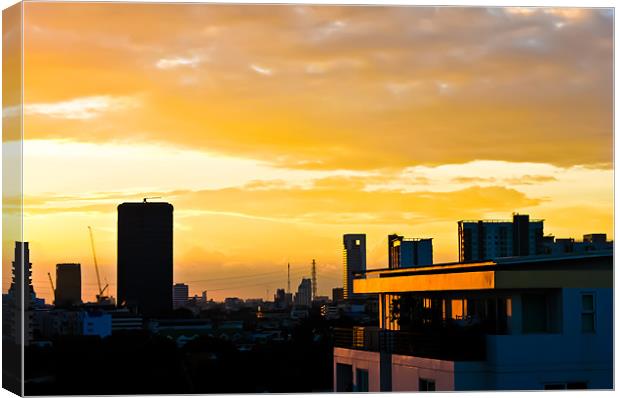 Bangkok Skyline at Sunset Canvas Print by Jonathan Callaghan