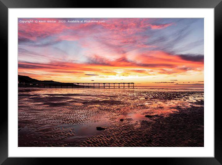 The Pier at Saltburn By the Sea during sunset fram Framed Mounted Print by Kevin Winter
