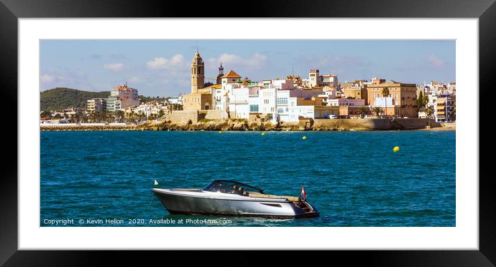 Power boat anchored Framed Mounted Print by Kevin Hellon