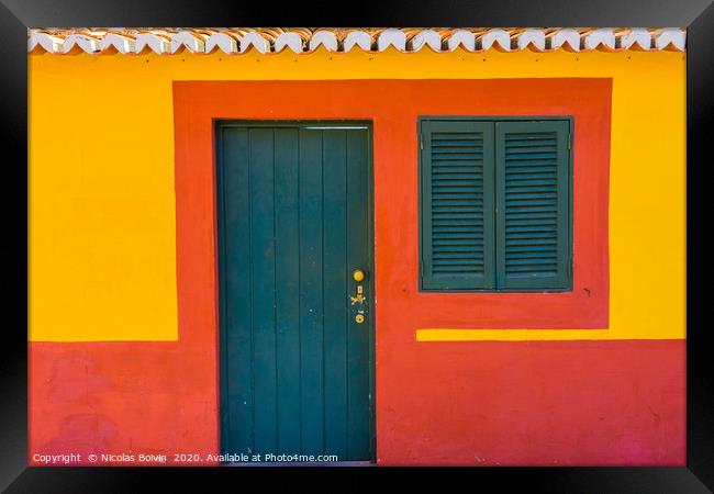 Painted wall in the streets of Funchal Framed Print by Nicolas Boivin