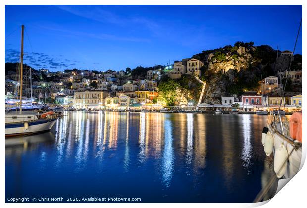 Symi Harbour at night Print by Chris North