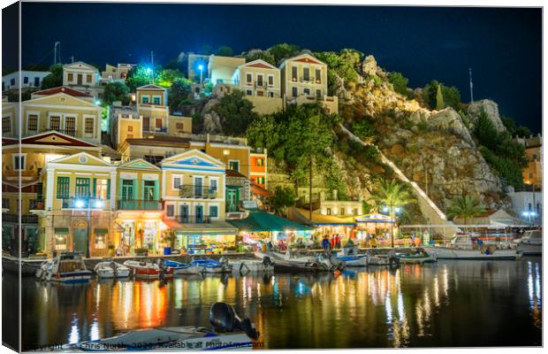 Symi Harbour at night. Canvas Print by Chris North