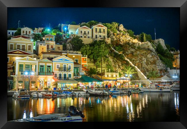Symi Harbour at night. Framed Print by Chris North