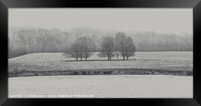 Foggy Winters Morning by the Lake  Framed Print by James Aston