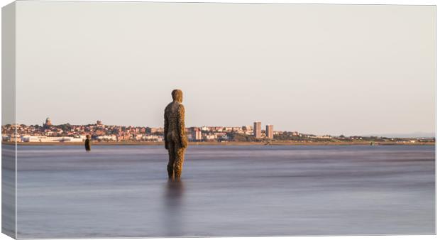 Iron Men watching the incoming tide Canvas Print by Jason Wells