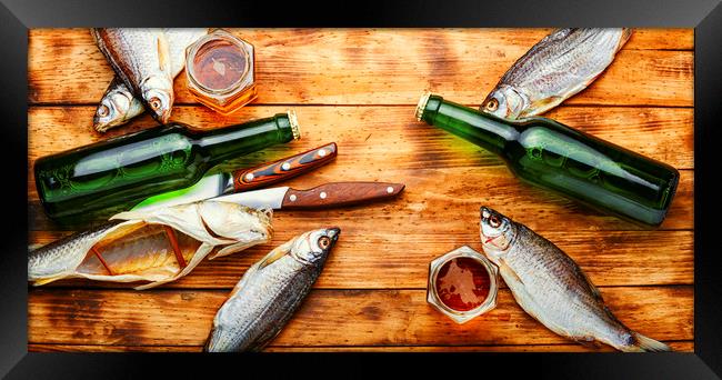 Dried fish and beer Framed Print by Mykola Lunov Mykola
