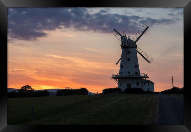 Llancayo windmill at sunset Framed Print by Paul Huddleston