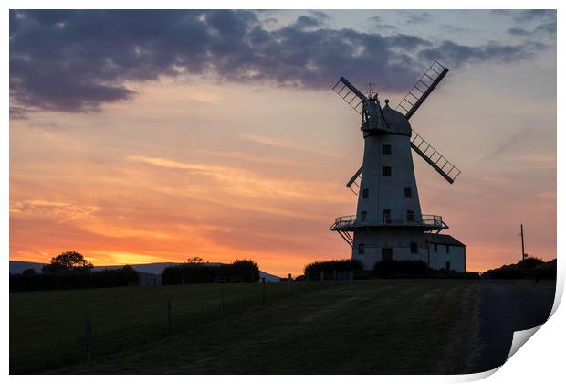 Llancayo windmill at sunset Print by Paul Huddleston