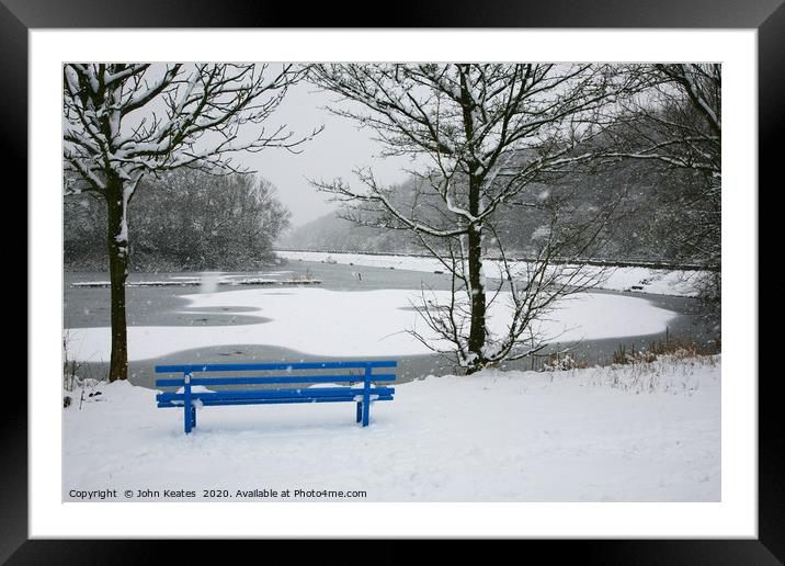 A snow covered blue bench at Bathpool Kidsgrove St Framed Mounted Print by John Keates