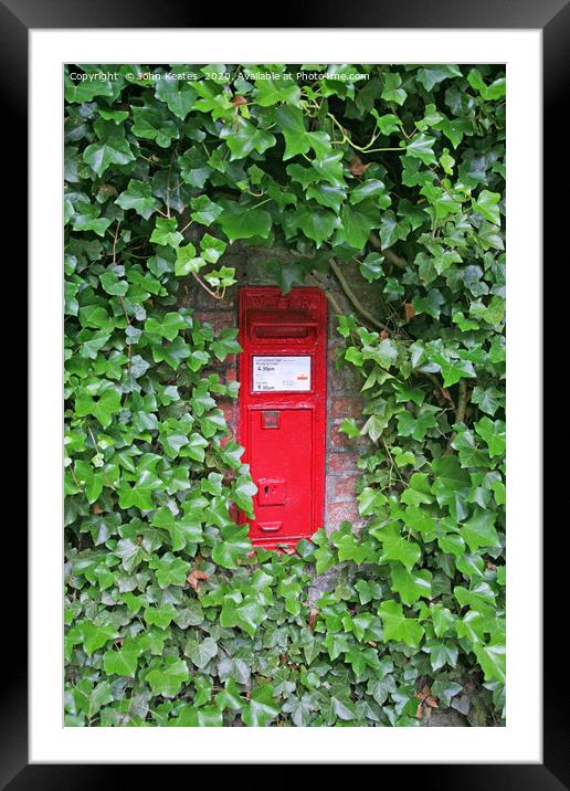 A red Victorian post box in an ivy covered wall Framed Mounted Print by John Keates