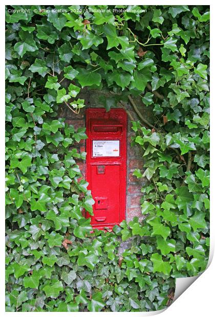 A red Victorian post box in an ivy covered wall Print by John Keates