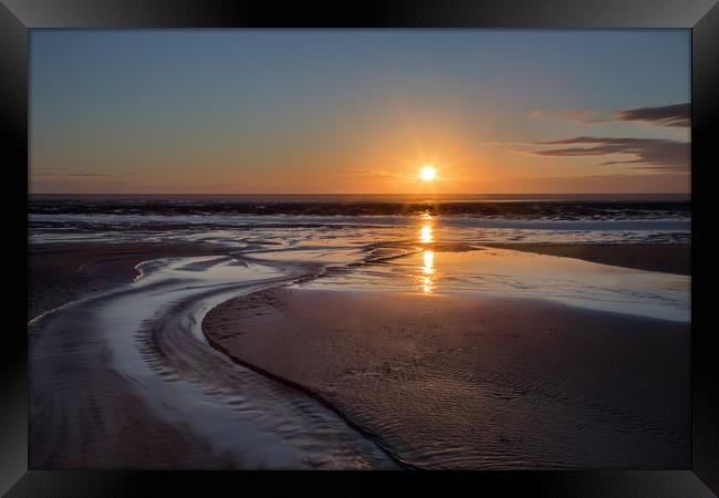 Sunset on Ainsdale Beach Framed Print by Roger Green
