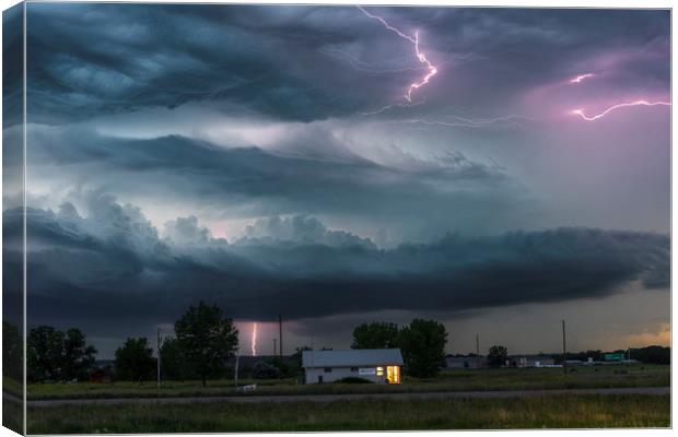 Forked Lightning Over a Montana Post Office, USA.  Canvas Print by John Finney