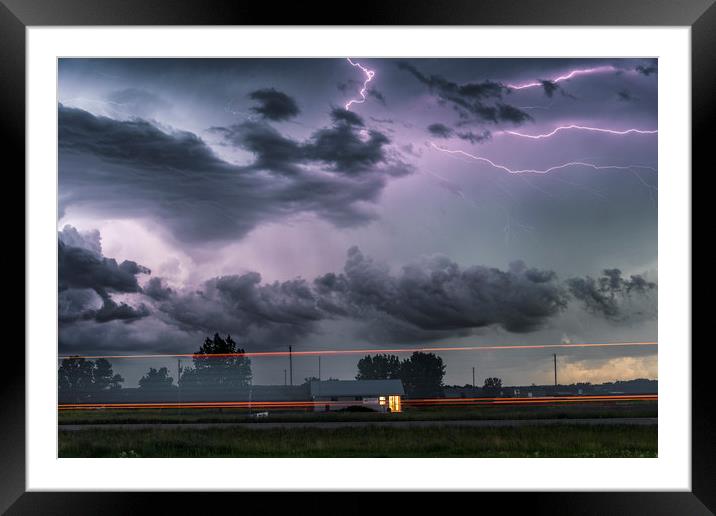 Forked Lightning Over a Montana Post Office, USA.  Framed Mounted Print by John Finney