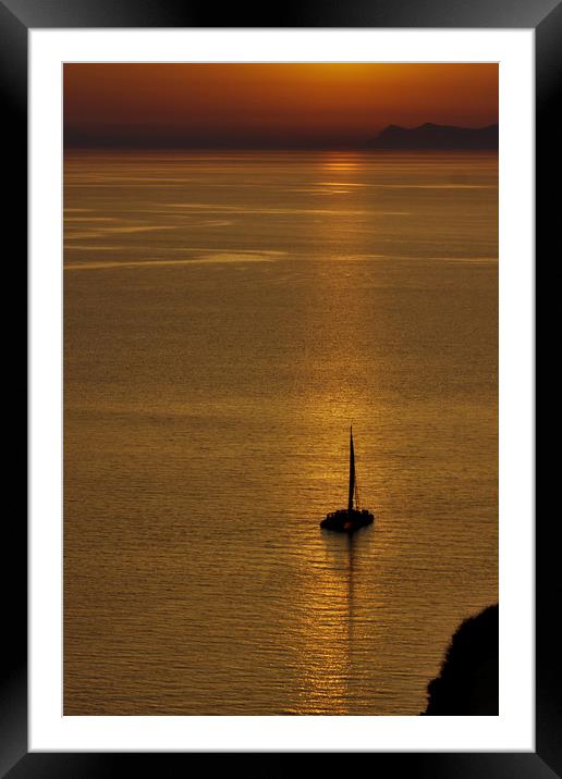 Boat in the Sunset at Oia Framed Mounted Print by Jeremy Hayden