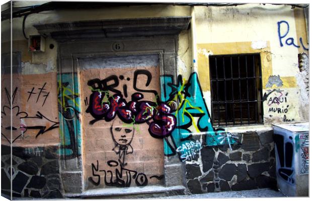 These are graffiti painted on the walls of the his Canvas Print by Jose Manuel Espigares Garc