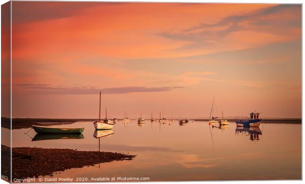 Dawn reflections at Brancaster Staithe Canvas Print by David Powley