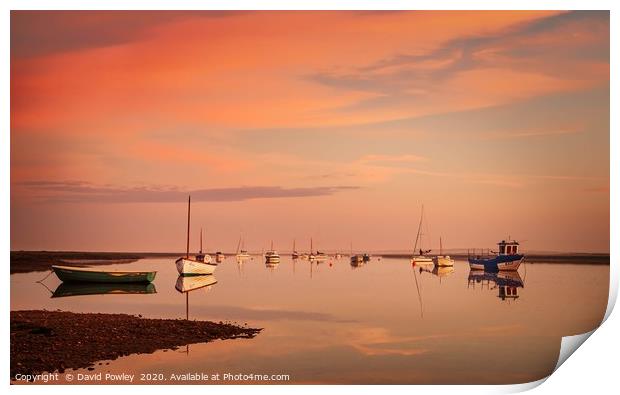 Dawn reflections at Brancaster Staithe Print by David Powley