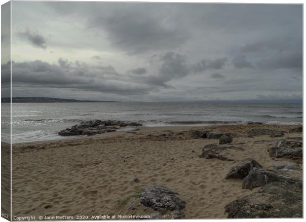 Clouds over the Beach Canvas Print by Jane Metters