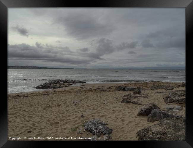 Clouds over the Beach Framed Print by Jane Metters