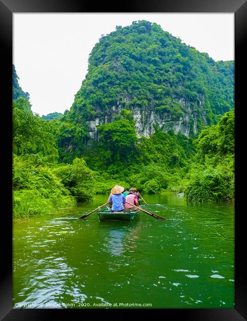 Quiet Ride On Peaceful Tam Coc River Framed Print by Nicolas Boivin